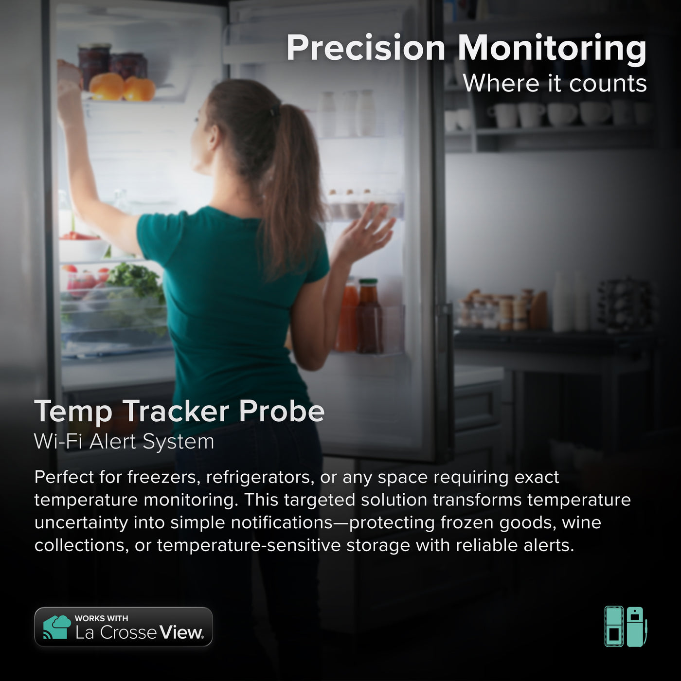 Temp Tracker alert and monitoring system offers the ability to monitor those hard to reach places with a cabled temperature probe sensor that includes an lcd screen for ambinet temerature and humidity on the sensor casing shown in a kitchen with a female opeing a refrigerator with helathy food on the shelves in a semi dark contemporary kitchen in greys and whites, the system works with the Bridge gateway and the La Crosse View app