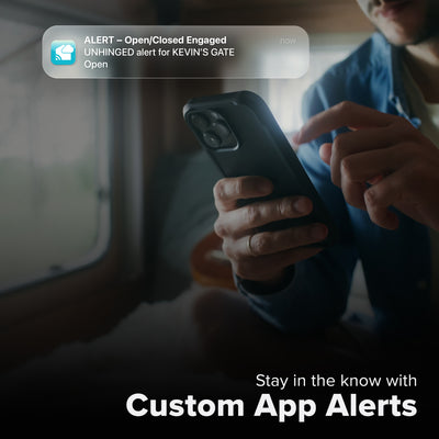 La Crosse Technology Alert and Monitoring system with a male receiving a message on their smartphone of an alert that their open close contact sensor detected a gate had opened with text that says stay in the know with Custom Alerts