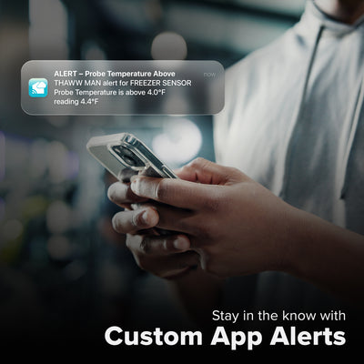 La Crosse Technology Alert and Monitoring system showing a man on a smartphone receiving an alert for the  freezer temperature increasing outside of the parameters of the custom alert for a temperature probe sensor with text that says stay in the know with Custom Alerts