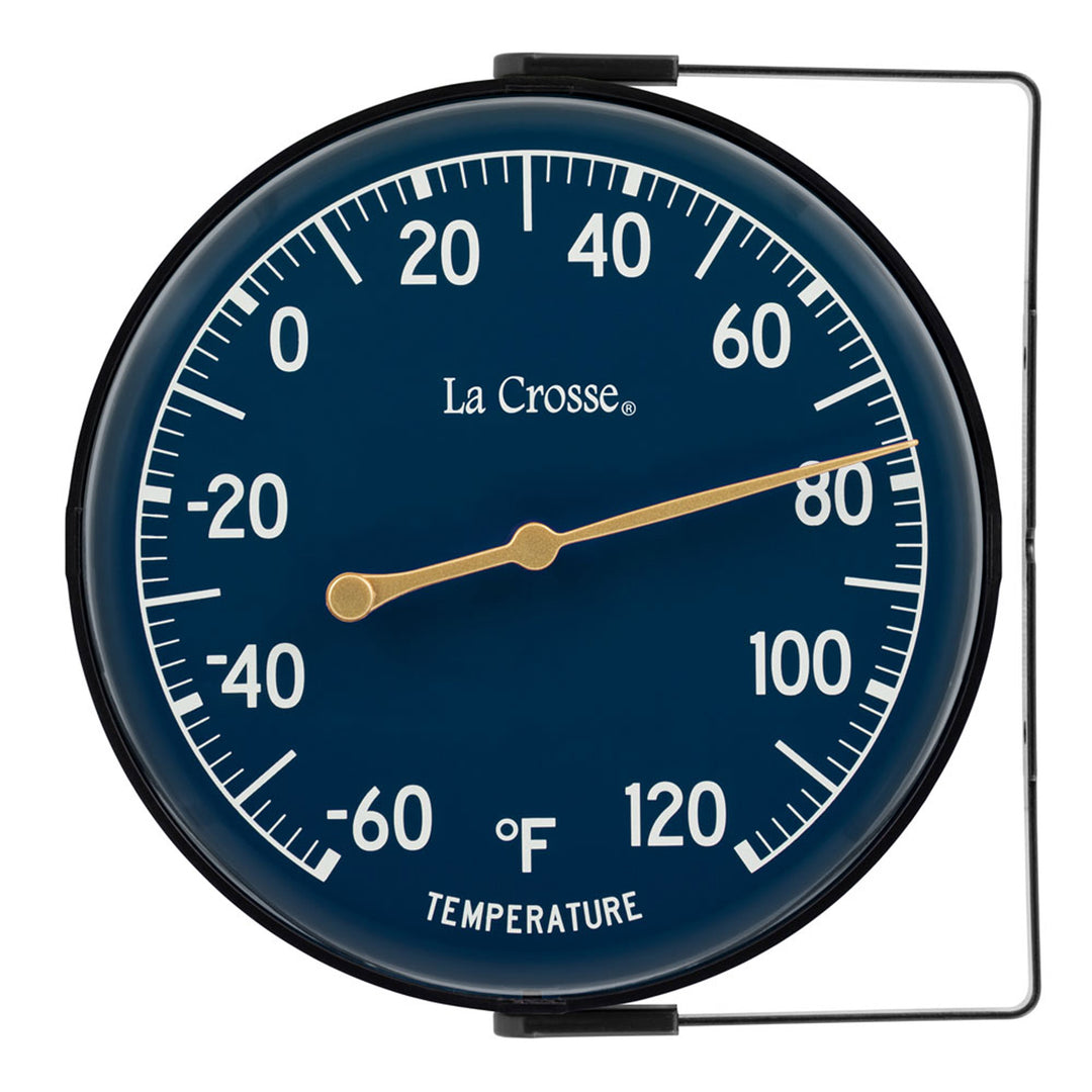 Head-on image of the 104-1512E 5-inch Dial Thermometer with Bracket features a navy blue dial with white temperature readings in a Fahrenheit scale from -60 to 120 degrees, with an antique gold pointer shown with the mounting bracket positioned to the right