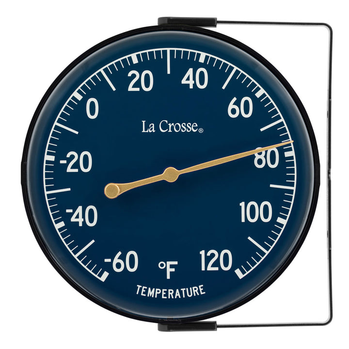 Head-on image of the 104-1512E 5-inch Dial Thermometer with Bracket features a navy blue dial with white temperature readings in a Fahrenheit scale from -60 to 120 degrees, with an antique gold pointer shown with the mounting bracket positioned to the right