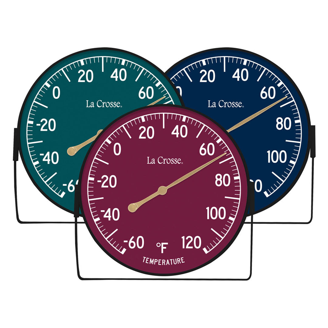Group image of all 3 colors of the 104-1512 in Emerald Green, Navy Blue, and Wine Red, the Dial Thermometers with Bracket feature colored dials with white temperature readings in a Fahrenheit scale from -60 to 120 degrees, with an antique gold pointer shown with the mounting bracket/stand positioned at the bottom
