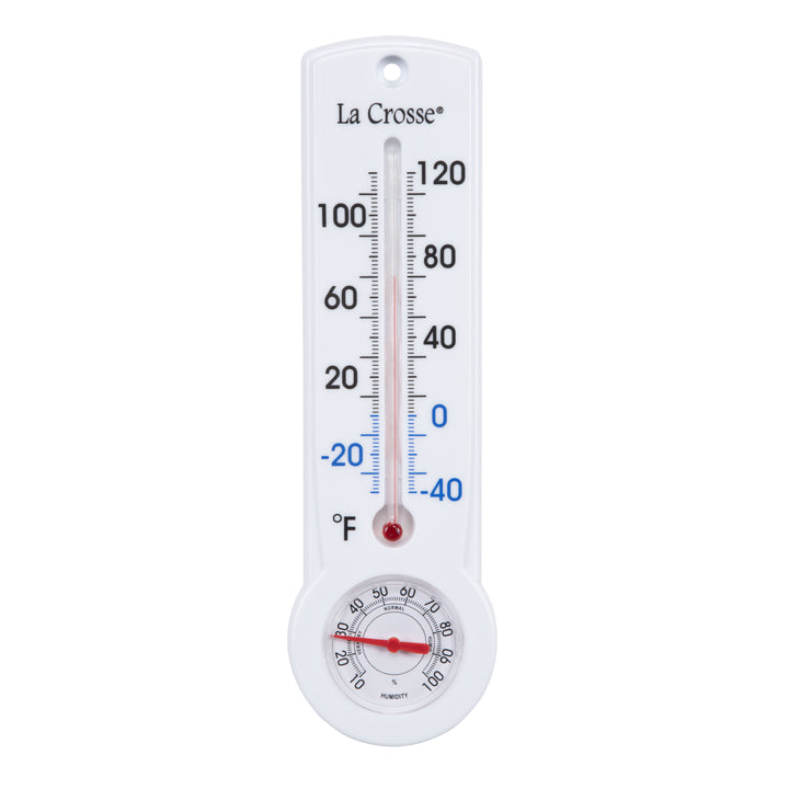 Head-on image of the 204-109 8.75-inch Thermometer with Hygrometer and Key Hider, constructed in a white case. The mercury-free capillary thermometer has a Fahrenheit temperature scale. Temperature markings below freezing appear in blue text, while those above freezing appear in black text. The Hygrometer dial reads 10-100 percent humidity, with a red pointer.