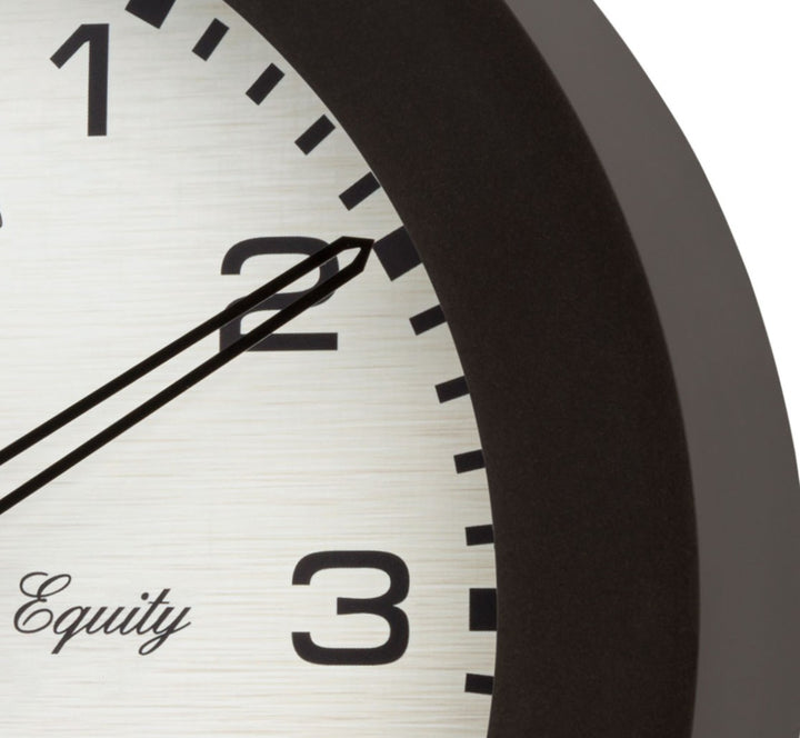 Closeup of the frame and the dial of the 29005 Waylon 10-inch indoor outdoor wall clock showing a dark brown frame and linen design dial