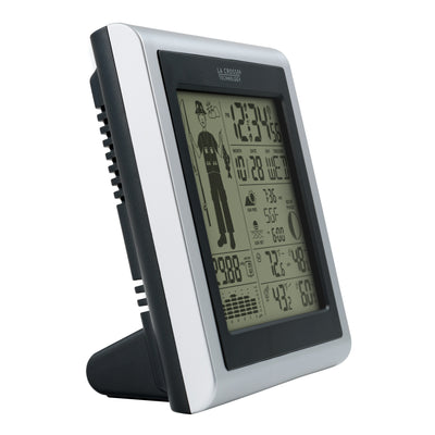 Side view of Fisherman icon weather station with temp humidity readings including moon phase sunrise sunset barometric pressure graph in a silver and black case 