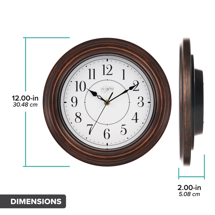 Orthographic dimensions of the 404-2630W Evelyn Wall clock with a head on and side view image and text 12 inch diameter and 2 inch depth also listing centimeters