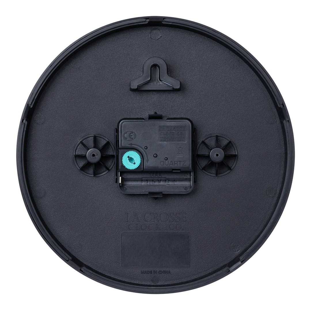 Back image of the 404-3020B-4TZ Four Pack 8-inch Basic Wall Clock with City Plaques showing the battery compartment, the quartz movement, and the hanging hole.