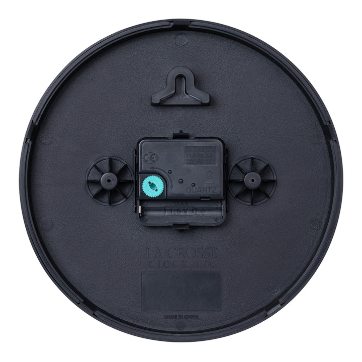 Back image of the 404-3020B-4TZ Four Pack 8-inch Basic Wall Clock with City Plaques showing the battery compartment, the quartz movement, and the hanging hole.