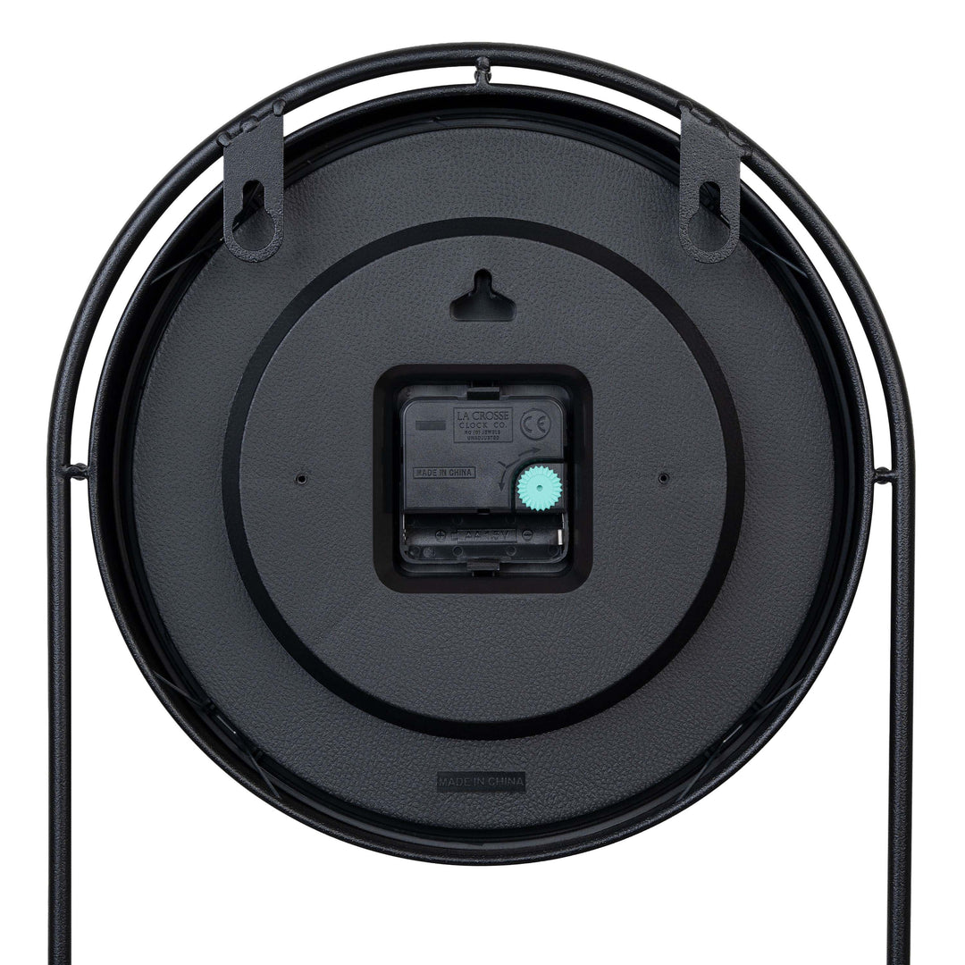 Back of the 404-3022 Depot Wall Clock with Basket and Shelf highighting the two hanging holes and the quartz movement with battery compartment.