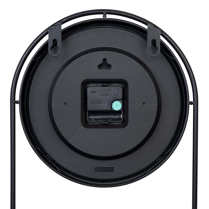 Back of the 404-3022 Depot Wall Clock with Basket and Shelf highighting the two hanging holes and the quartz movement with battery compartment.