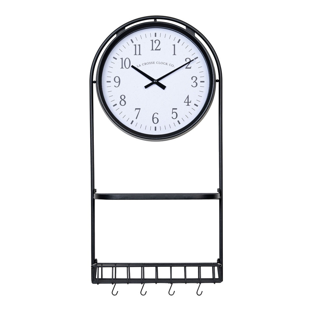 Head-on image of the 404-3022 Depot Wall Clock with Basket and Shelf featuring a Black Metal Frame with a shelf, a basket with four "S" hooks, an archival paper-inspired dial, black numbers, and black metal hour and minute hands.