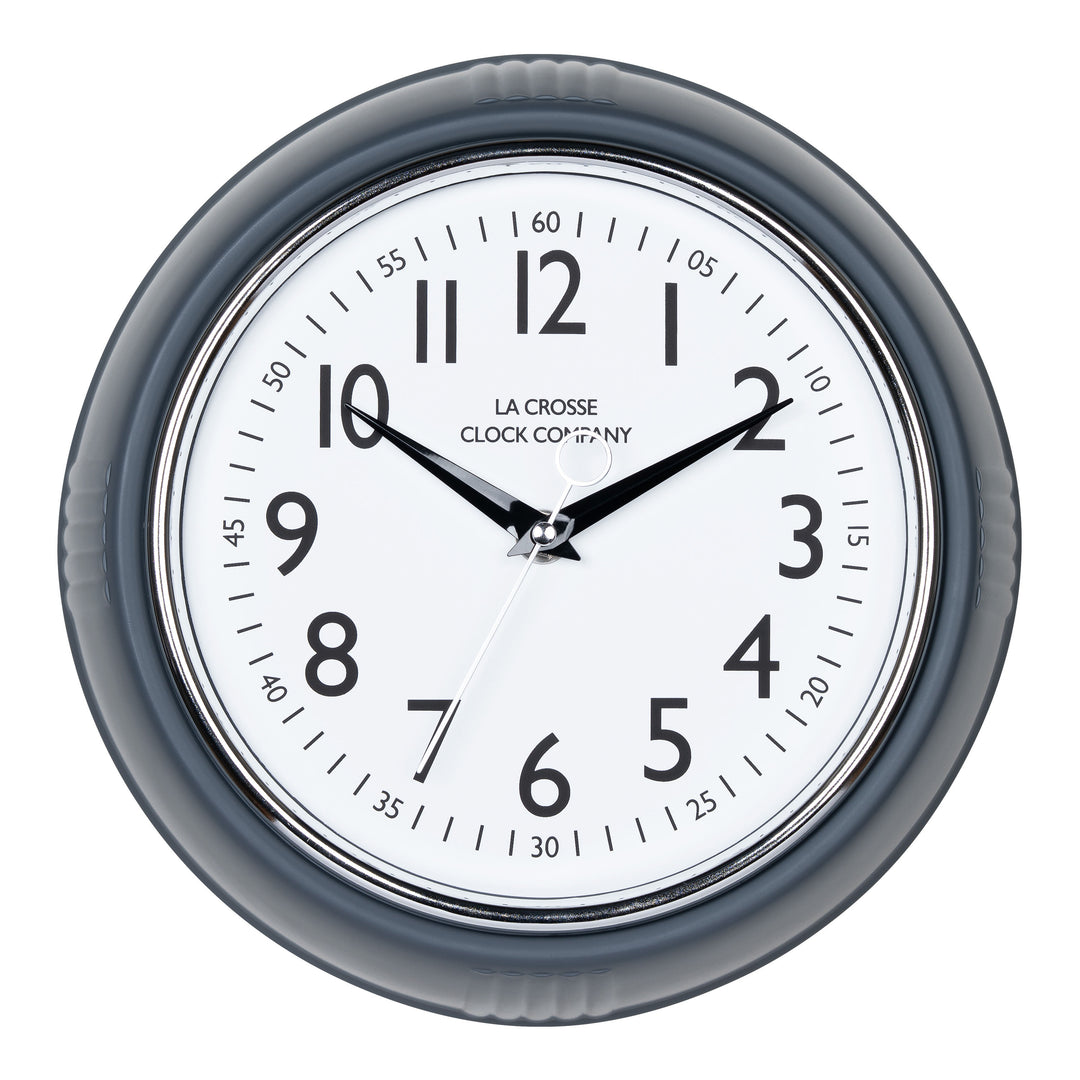 Head-on image of the 404-3024DS 9.5-inch Diner Clock – Dark Slate. The clock features a retro-style dark slate frame with a white dial, chrome bezel, black numbers and minute markings, black metal hands, and a silver second hand.
