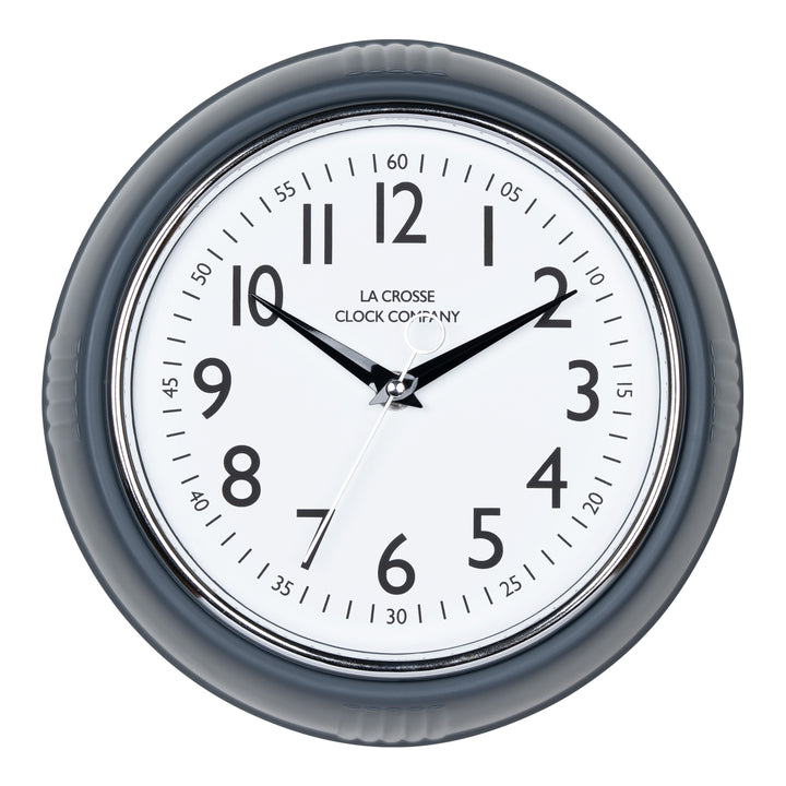 Head-on image of the 404-3024DS 9.5-inch Diner Clock – Dark Slate. The clock features a retro-style dark slate frame with a white dial, chrome bezel, black numbers and minute markings, black metal hands, and a silver second hand.