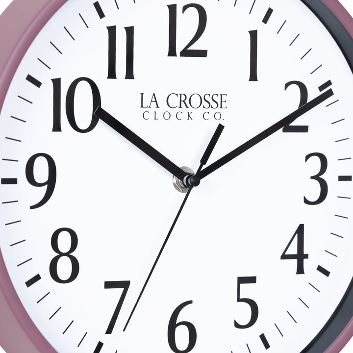 Close-up image of the dial of the 404-3025RR 10-inch Basic Decor Wall Clock with a Ruby Red Rose frame, white dial with black numbers, hour, and minute hands, and a black second hand
