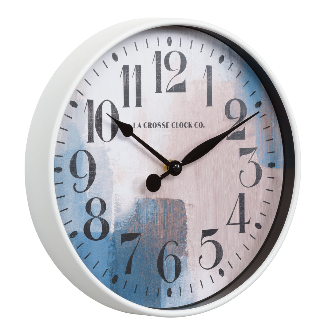 Right facing 11 inch 404-3028A Brushstroke wall clock highlighting the white case that surrounds a painted brush design dial in blues creams and taupe black with numbers and black metal hands