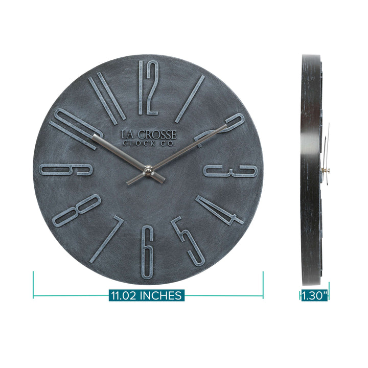 Dimensions of the 404-3028B Cormac 11 inch open face molded dark gray wall clock showing the side view and the head on of the clock