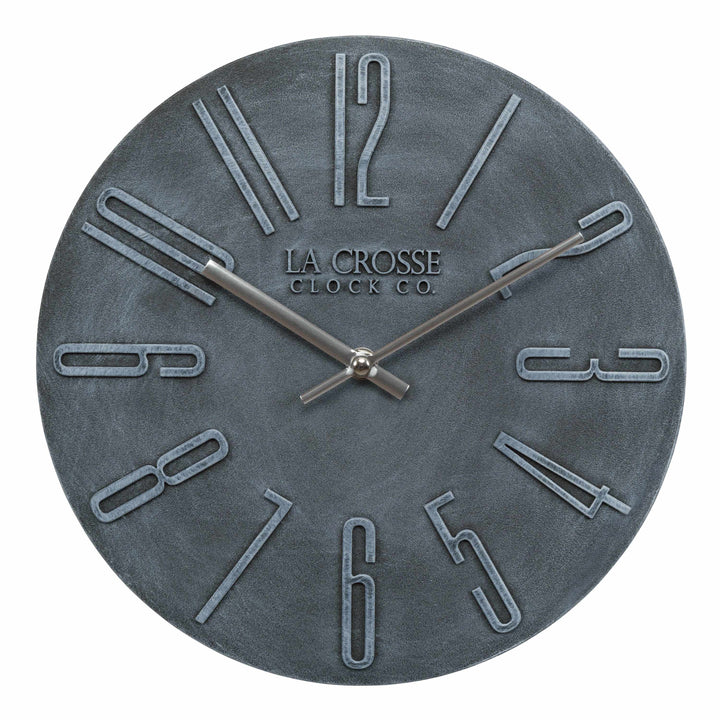 Head on image of the 404-3028B Cormac 11.02-inch Wall Clock features a bold molded three-dimensional frame with silver premium metal hands in an open-face design