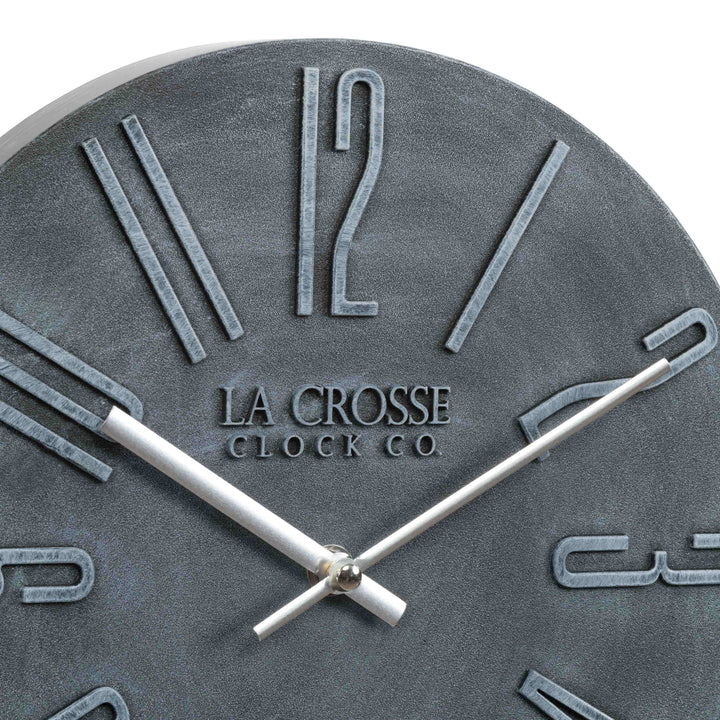 Hands close up of the 404-3028B Cormac 11 inch open face molded dark gray wall clock with numbers in relief and silver metal hour and minute hands