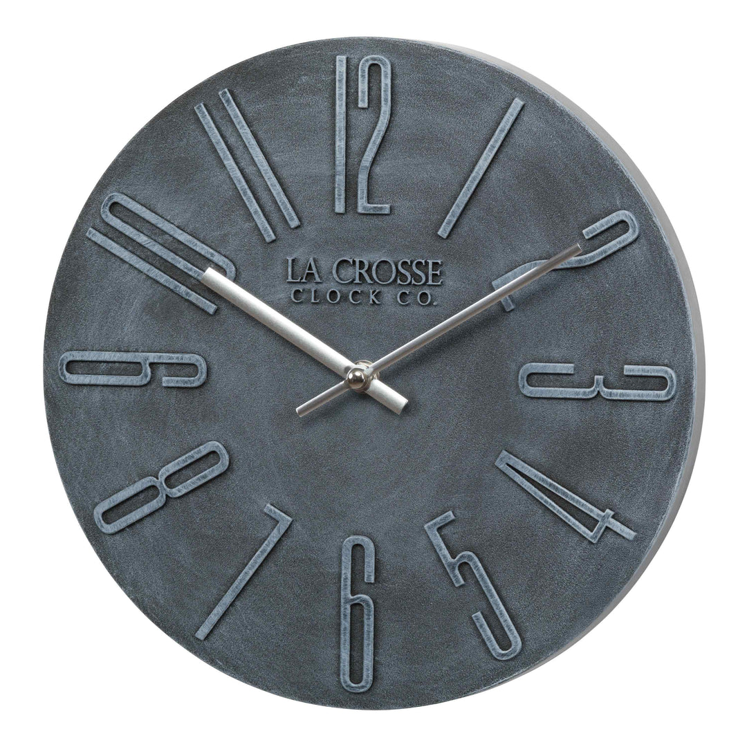 Left facing 404-3028B Cormac 11 inch open face molded dark gray wall clock with numbers in relief and silver metal hour and minute hands