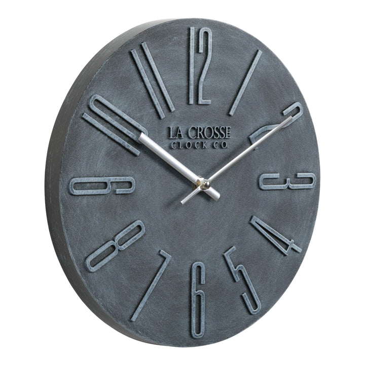 Right facing 404-3028B Cormac 11 inch open face molded dark gray wall clock with numbers in relief and silver metal hour and minute hands