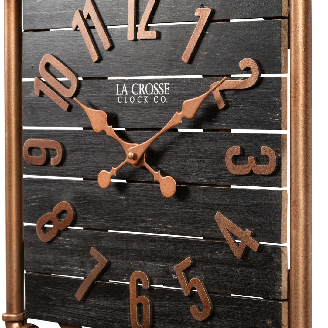 Close-up frame image of the 404-3412D 16-inch Foundry Metal &amp; Wood Wall Clock - Dark. The clock features a square metal pipe frame, stained wood slats, and metal pewter finish accents.