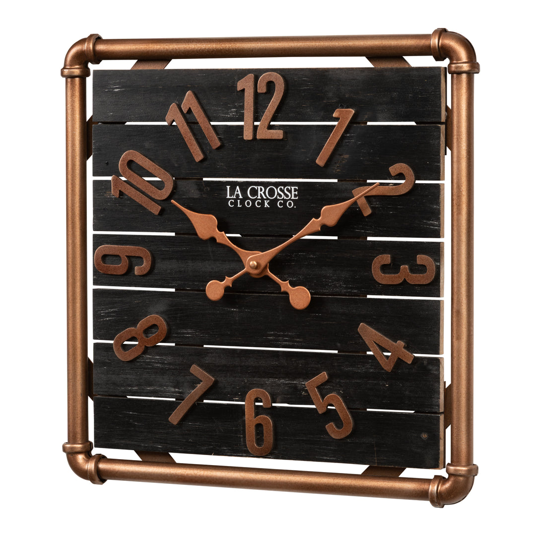 Left-facing image of the 404-3412D 16-inch Foundry Metal &amp; Wood Wall Clock - Dark. The clock features a square metal pipe frame in a copper finish, a black-stained wood slat clock face with copper-finished metal numbers and hands.
