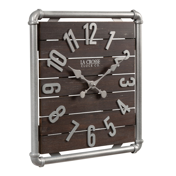 Right-facing image of the 404-3412L 16-inch Foundry Metal &amp; Wood Wall Clock - Light. The clock features a square metal pipe frame in a weathered pewter finish, a truffle-brown-stained wood slat clock face with pewter-finished metal numbers and hands.