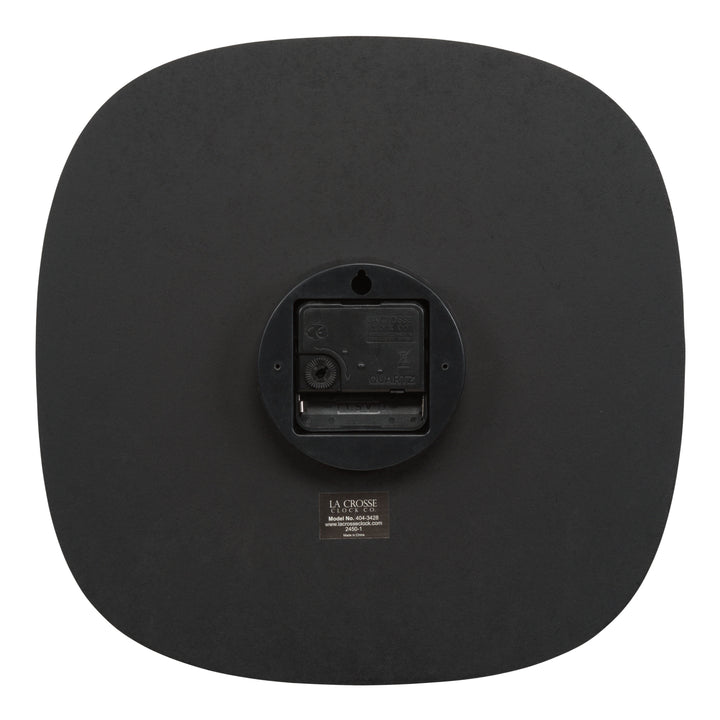Back of the Sylvie 404-3428 wall clock showing the battery compartment and the La Crosse Clock brand quartz movement