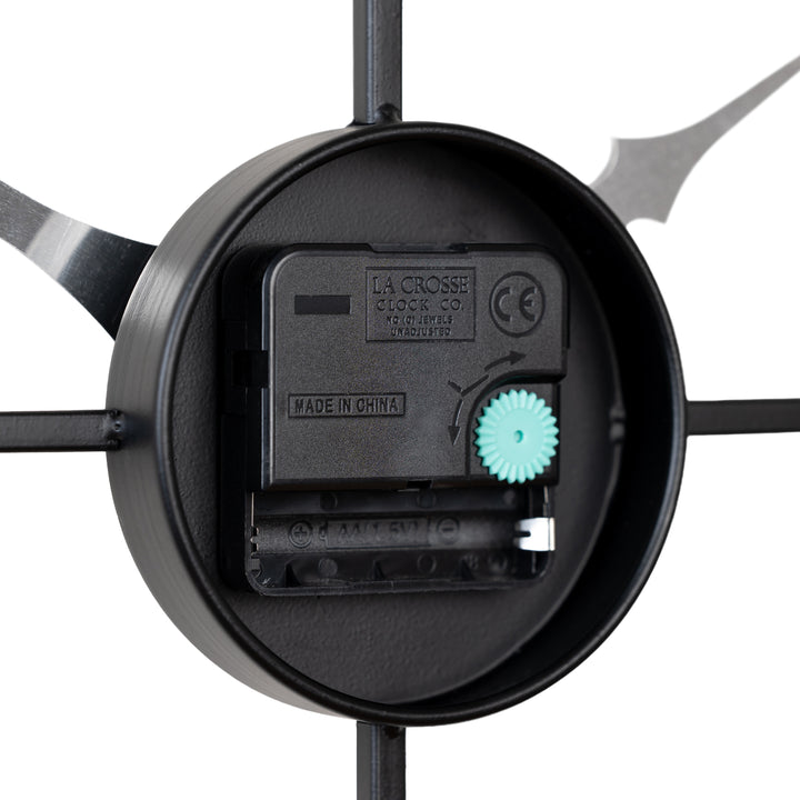 Close-up image of the quartz movement of the Head-on image of the 404-3451A 20-inch Metal Tower Wall Clock - Arabic.