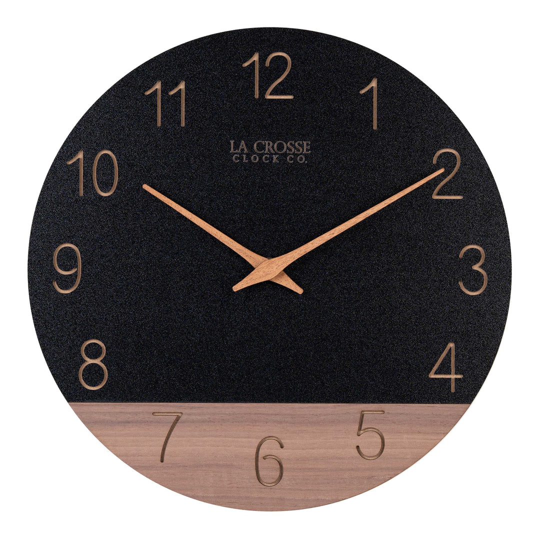 Head-on image of the 404-3630C 12-inch Sierra Wood Wall Clock - Black, the clock features a black and wood split design open-face dial, with laser cut numbers, and wood hour and minute hands.
