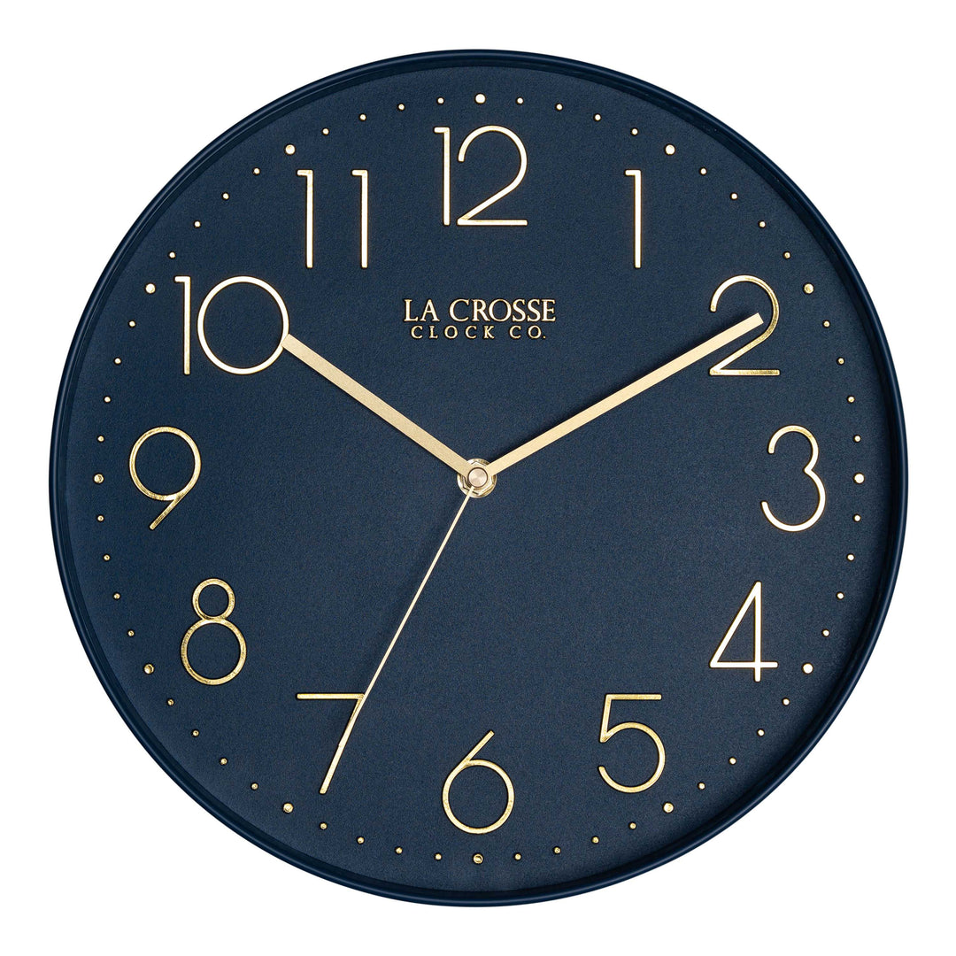 Head-on image of the 404-3831NB 12-inch Paxton Wall Clock - Navy Blue, with Silent Sweep, featuring a flush-mount navy blue frame, a matching color dial, brass raised numbers, and brass-finished hour, minute, and second hands.