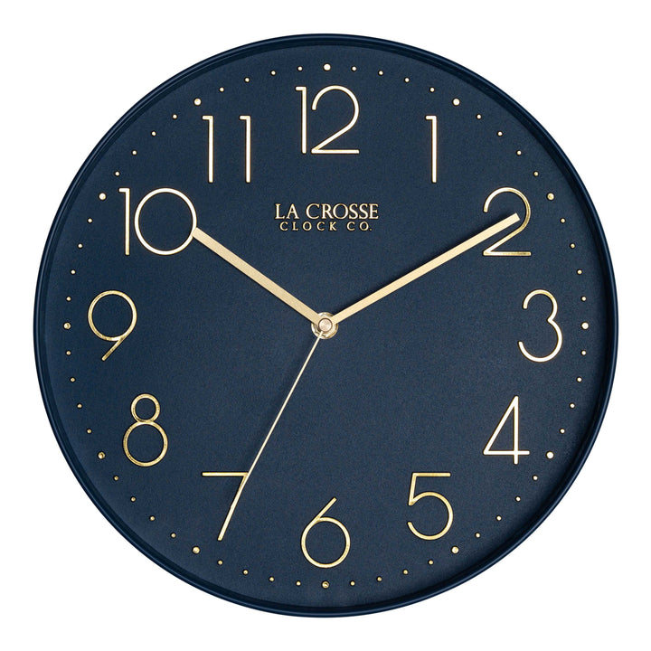 Head-on image of the 404-3831NB 12-inch Paxton Wall Clock - Navy Blue, with Silent Sweep, featuring a flush-mount navy blue frame, a matching color dial, brass raised numbers, and brass-finished hour, minute, and second hands.