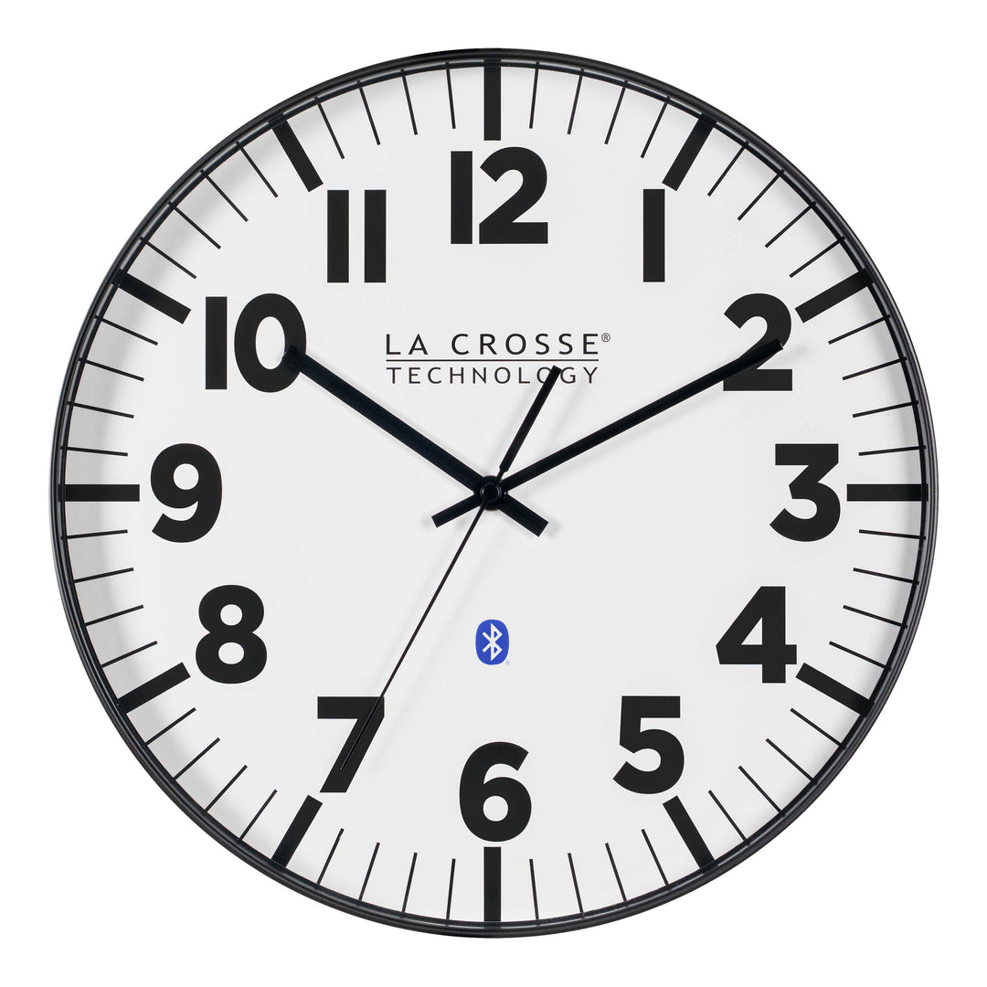 Head-on image of the 404-4536 14.2-inch Insta-Set Wall Clock with Bluetooth® Technology the clock features a white dial with bold black numbers and markings, a black flush-mount frame, and black hands.