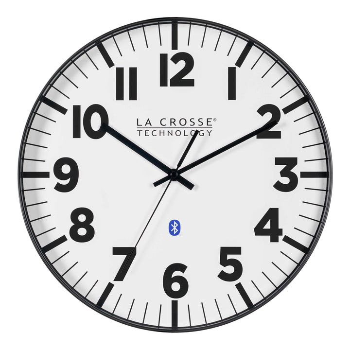 Head-on image of the 404-4536 14.2-inch Insta-Set Wall Clock with Bluetooth® Technology the clock features a white dial with bold black numbers and markings, a black flush-mount frame, and black hands.