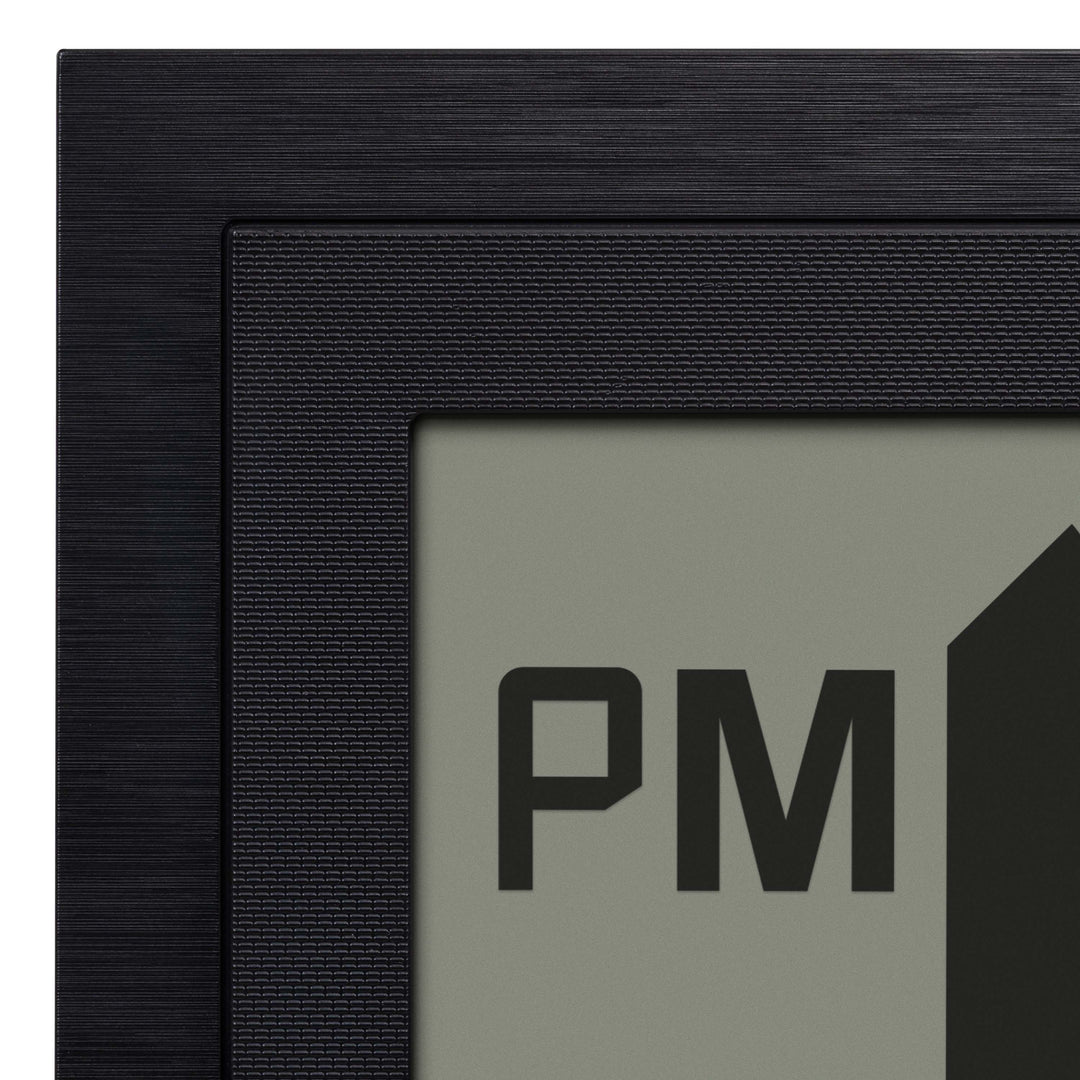Close-up image of the frame of the 515-1419v2 Atomic Digital Wall Clock with Time Advance. The digital wall clock detail shows the textured dual black frame.