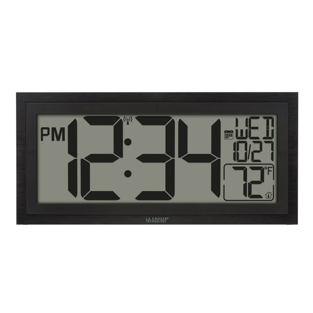 Head-on image of the 515-1419v2 Atomic Digital Wall Clock with Time Advance. The digital wall clock features a dual black frame, easy-to-read 4.49-inch time digits, indoor temperature reading of 72 degrees Fahrenheit, and a calendar.