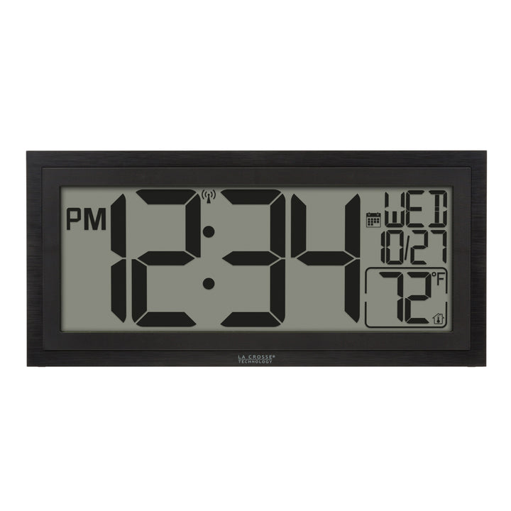 Head-on image of the 515-1419v2 Atomic Digital Wall Clock with Time Advance. The digital wall clock features a dual black frame, easy-to-read 4.49-inch time digits, indoor temperature reading of 72 degrees Fahrenheit, and a calendar.
