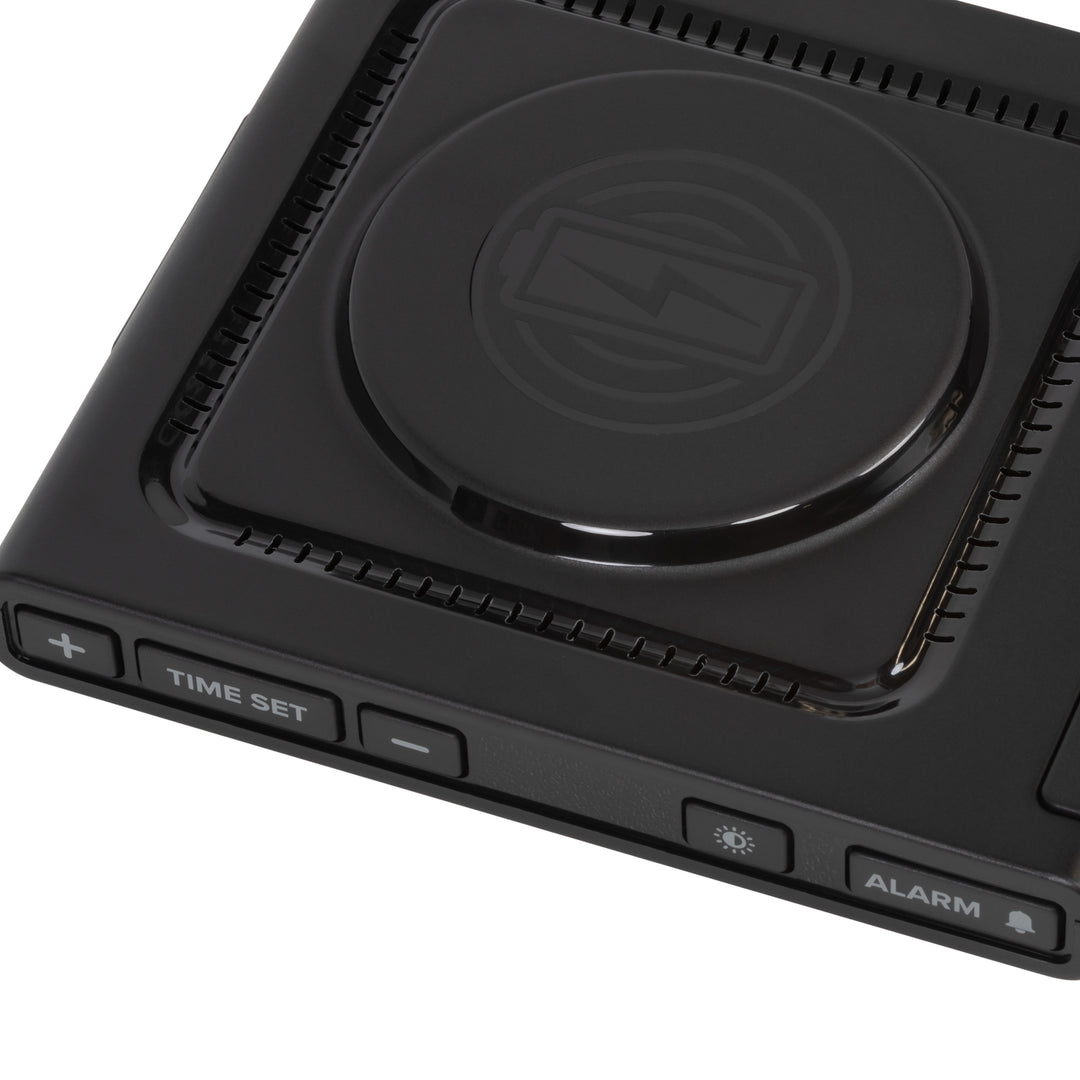 Close-up detail image of the 617-143 Amp Mini 15W Wireless Charging LED Alarm Clock showing the wireless charging pad and easy access buttons.