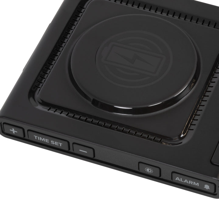 Close-up detail image of the 617-143 Amp Mini 15W Wireless Charging LED Alarm Clock showing the wireless charging pad and easy access buttons.