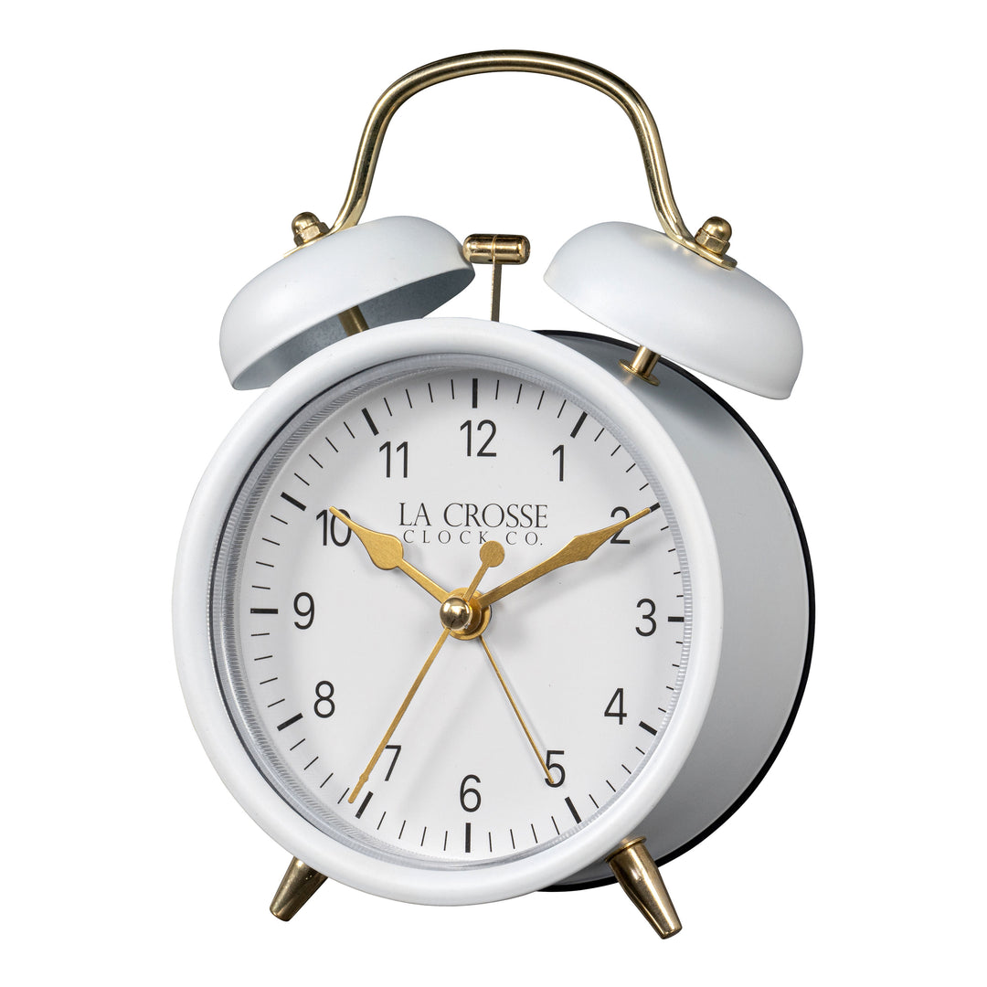 Left-facing image of the 617-3314W Metal Twin Bell Alarm Clock – White, the clock features a white dial with black numbers, gold hands and accents, in a white metal case.