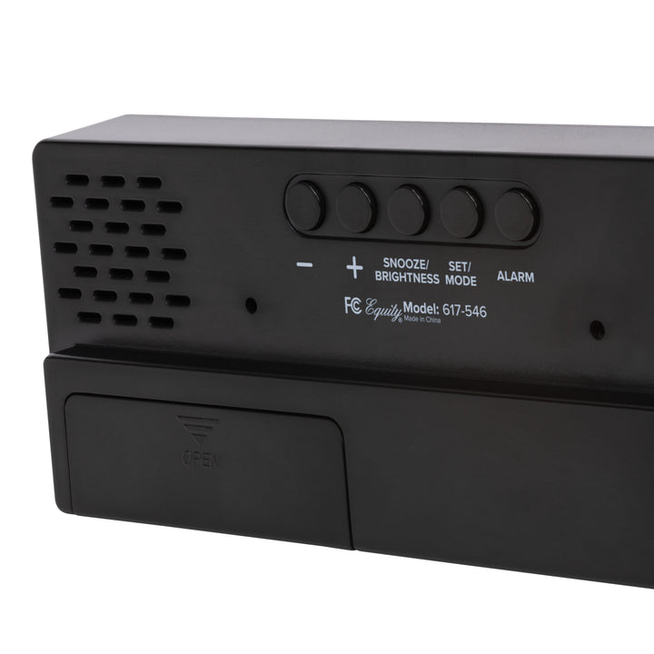 Close-up image of the back of the 617-546 2.0-inch Red LED Alarm Clock with indoor temperature showing the button functions and the battery compartment.