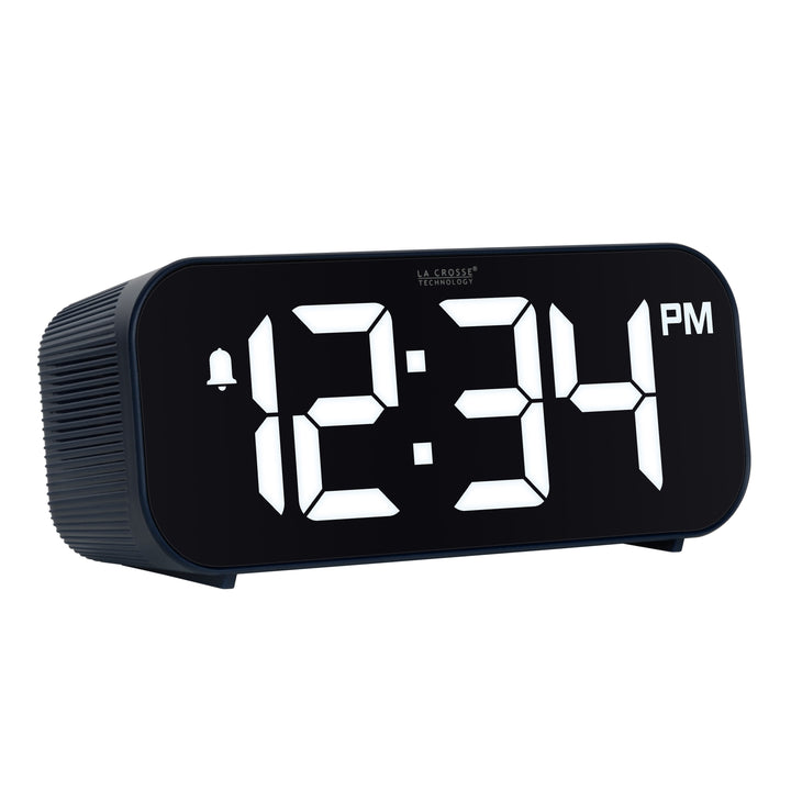 Right-facing image of the 617-714BL Insta-Set Digital LED Alarm Clock with Bluetooth® Technology - Navy. The alarm clock features large white digits, a PM indicator, and an alarm icon in a navy blue case.
