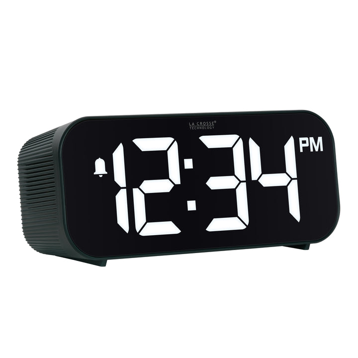 Right-facing image of the 617-714G Insta-Set Digital LED Alarm Clock with Bluetooth® Technology - Green. The alarm clock features large white digits, a PM indicator, and an alarm icon in a green case.