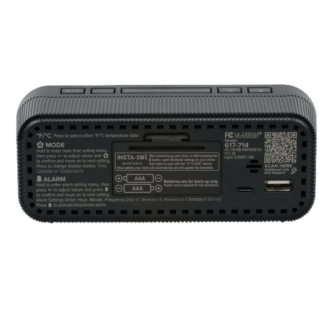 Back image of the 617-714 Insta-Set Digital LED Alarm Clock with Bluetooth® Technology in Black, showing the buttons, the battery compartment, the USB-C power port, the USB-A charging port, and the operating instructions.