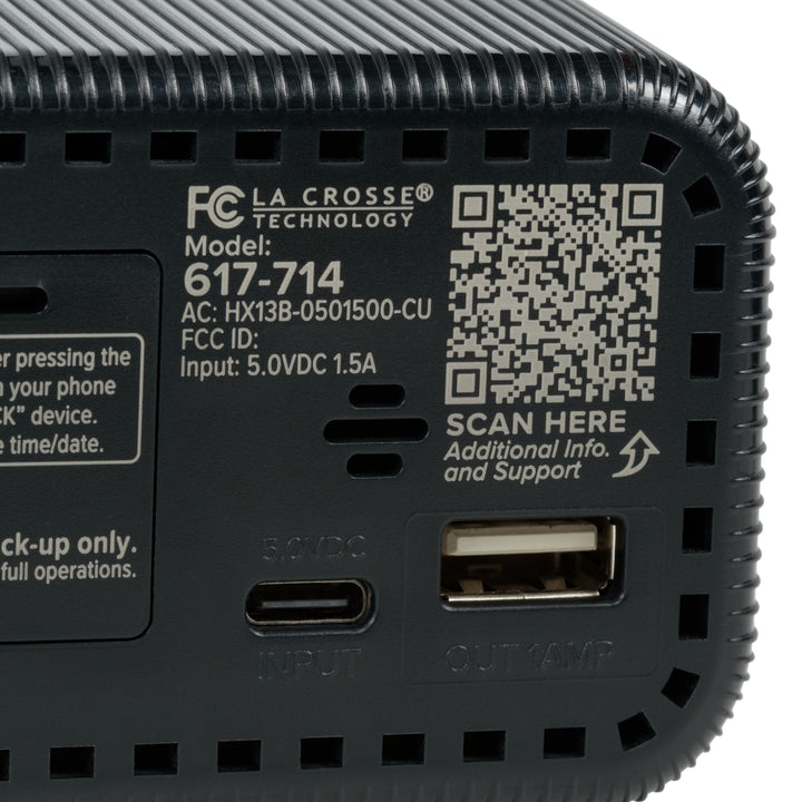 Close-up image of back of the 617-714 Insta-Set Digital LED Alarm Clock with Bluetooth® Technology in Black, showing the USB-C power port, the USB-A charging port, and a WR code for support.