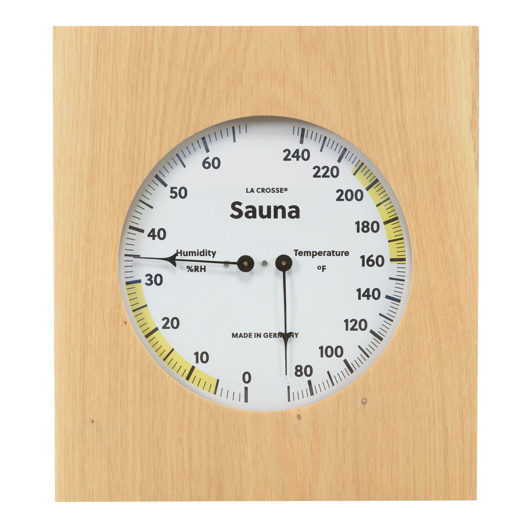 914-620 Sauna Thermometer and Hygrometer dial in oiled oak wood casing displaying a dial split in half with temperature on the right in Fahrenheit from 60 degrees to 245 degrees with optimal range in yellow and the left half showing humidity readings from 0 percent to 75 percent with the optimal range highlighted in yellow