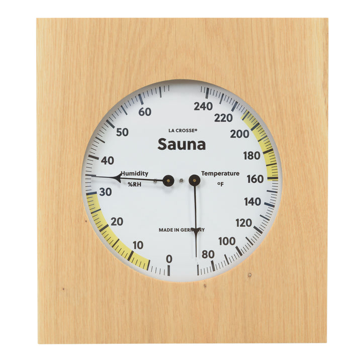 914-620 Sauna Thermometer and Hygrometer dial in oiled oak wood casing displaying a dial split in half with temperature on the right in Fahrenheit from 60 degrees to 245 degrees with optimal range in yellow and the left half showing humidity readings from 0 percent to 75 percent with the optimal range highlighted in yellow