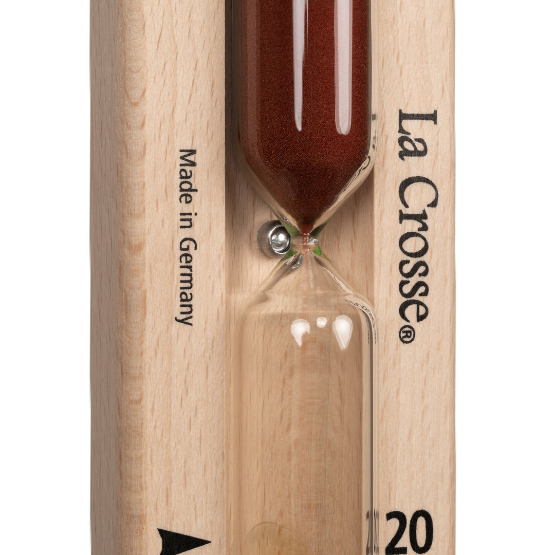 Closeup image of the 918-631 Sauna Hourglass Timer showing the wood casing, glass tube, and red sand with the La Crosse logo and Made in Germany text