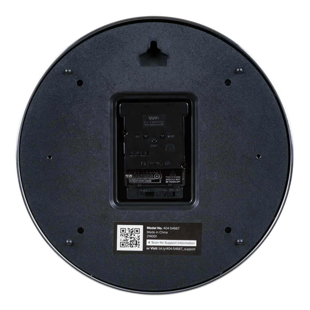 Back image of the 404-54667 10-inch Atomic metal Chater Ring Wall Clock showing the battery compartment, atomic quartz movement, and the hanging hole.