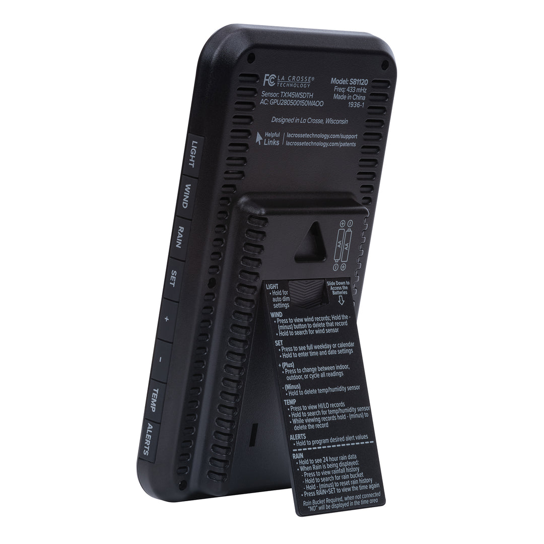 Back image of the S81120 Color Weather Station with Breeze showing the pull-out kickstand, the operating buttons, the screen printed directions, and the hanging key hole.